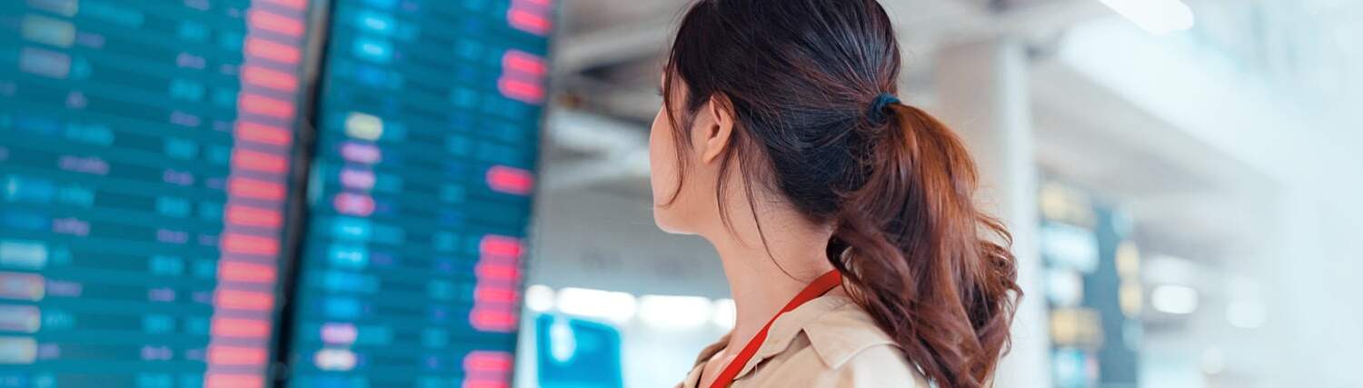 Woman looking at the schedule