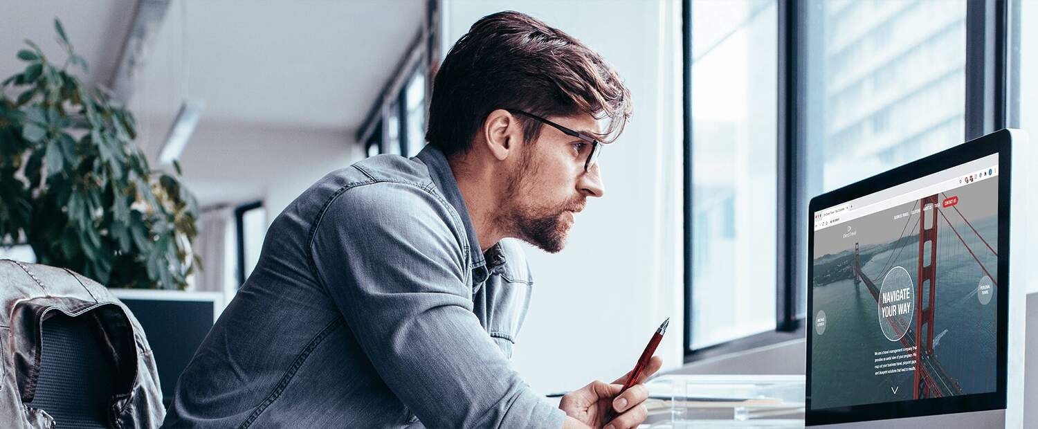 Man working in front of his computer