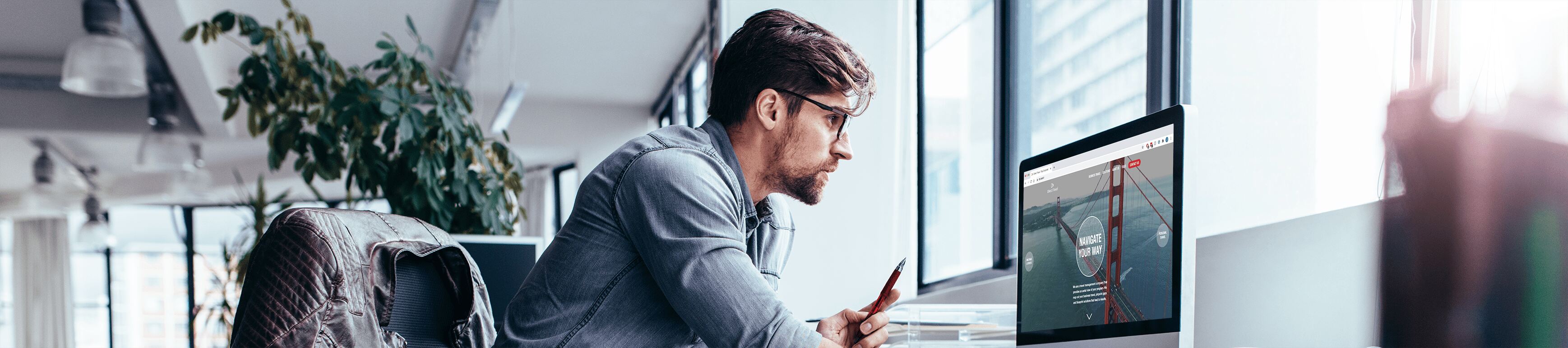 Man working in front of his computer