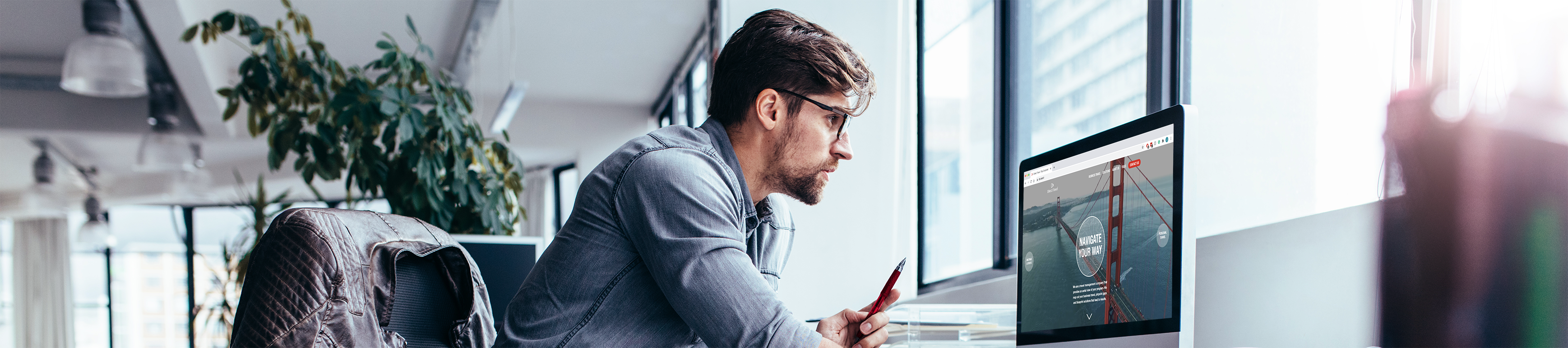 Man working in front of his computer