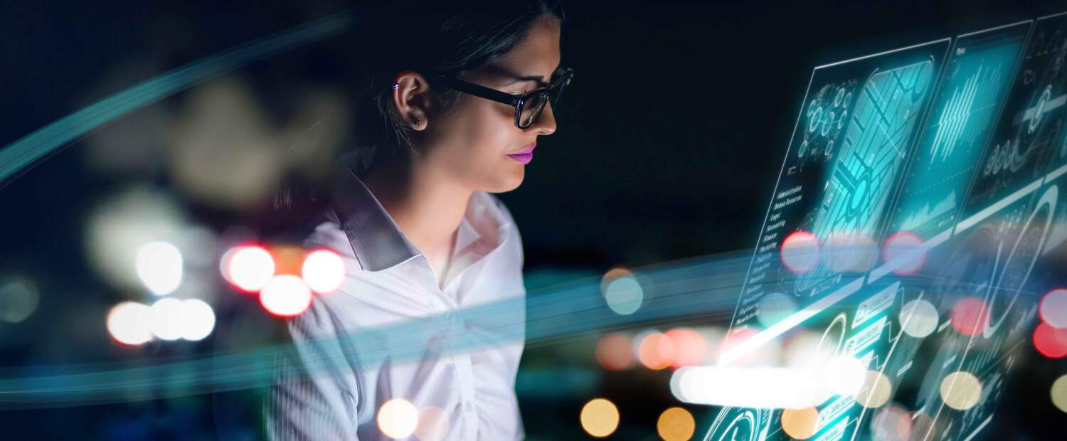 Woman in front of a computer screen