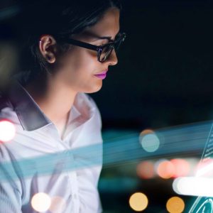 Woman in front of a computer screen