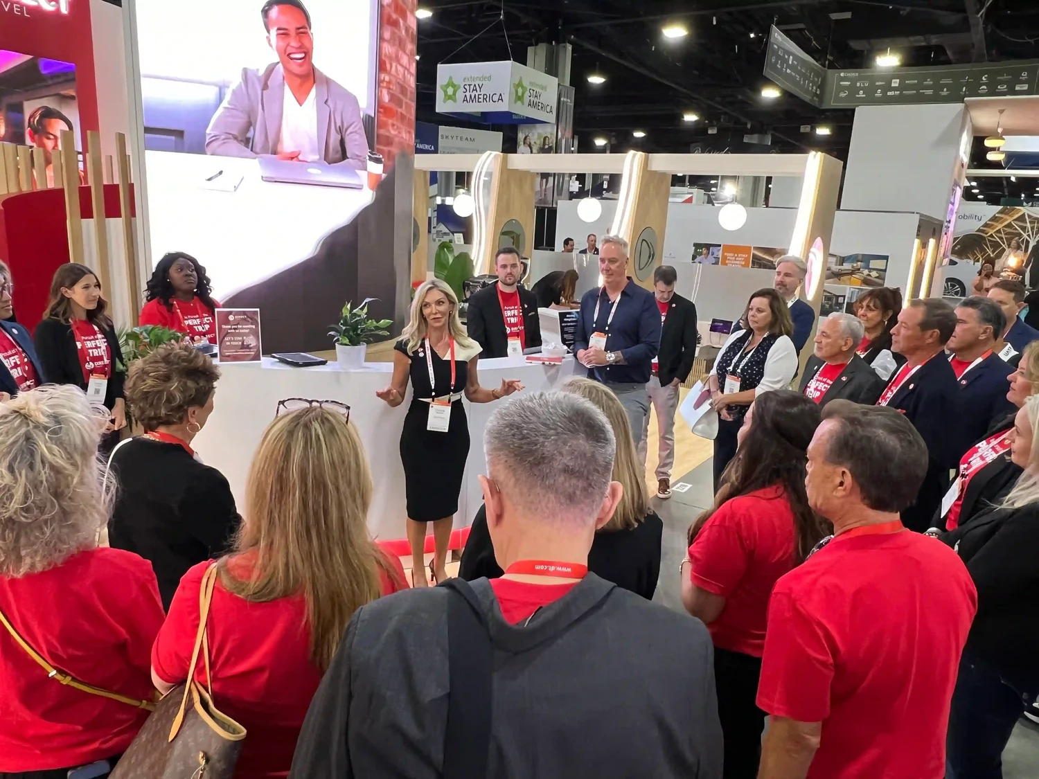 CEO Christal Bemont speaking to employees at GBTA